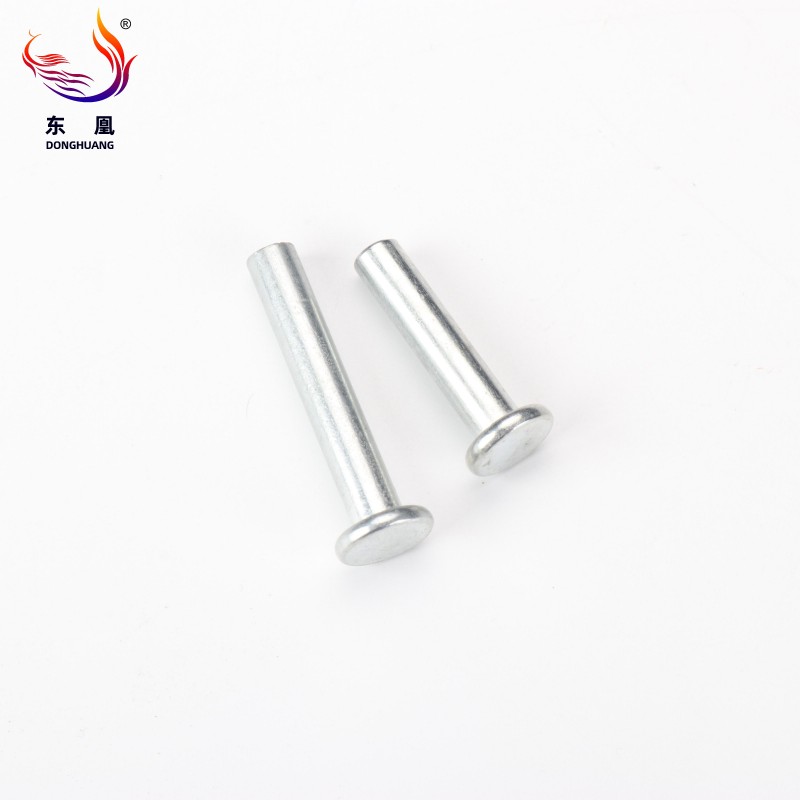 Aluminum Thin Flat Head Semi-Tubular Rivet installed flush on a metal panel