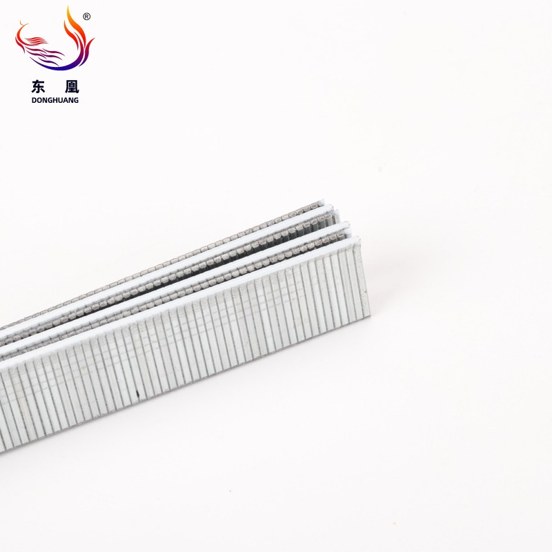 F15 Galvanized Fine-Gauge Brad Nail loaded in a pneumatic nail gun for precision woodworking
